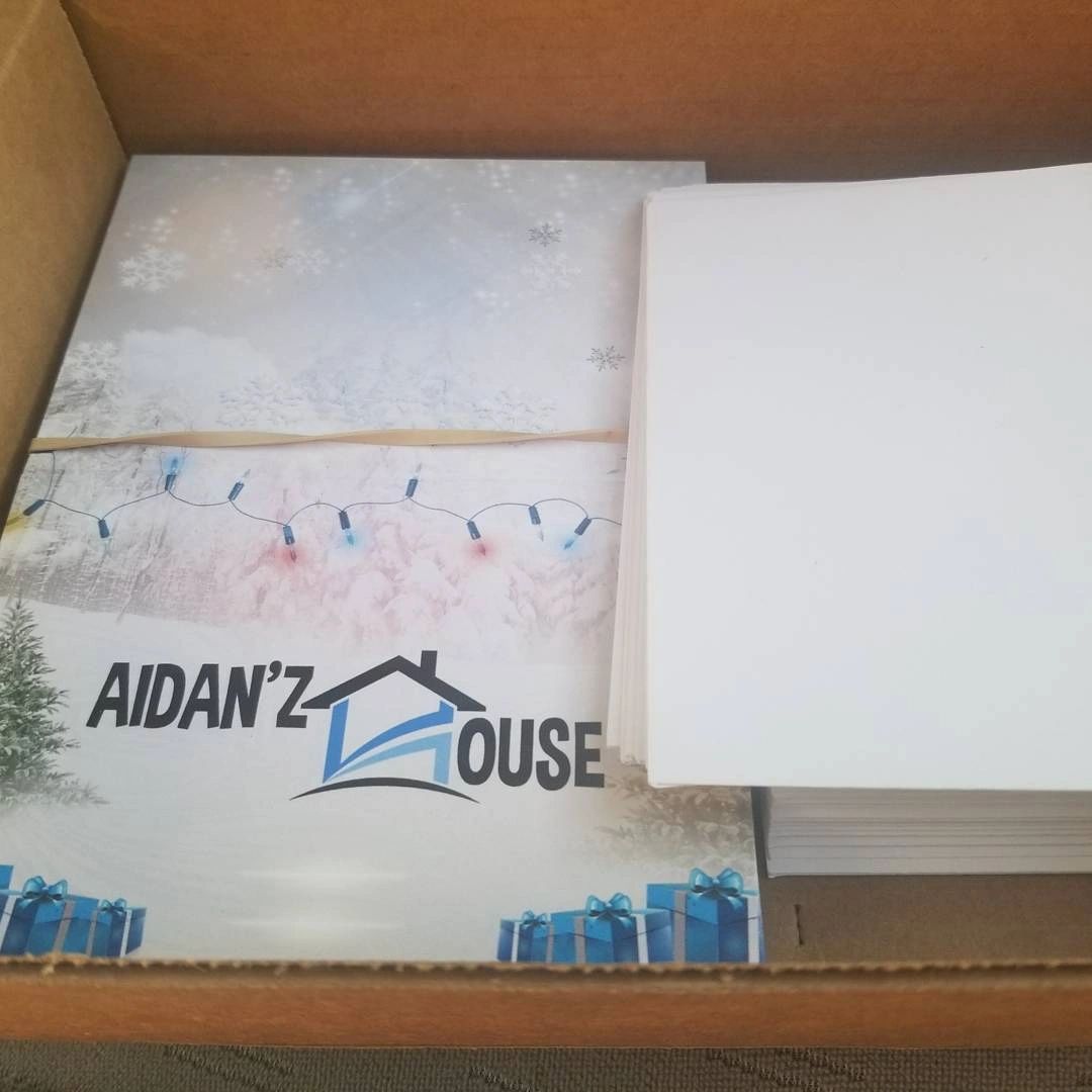 Branded box with holiday print materials